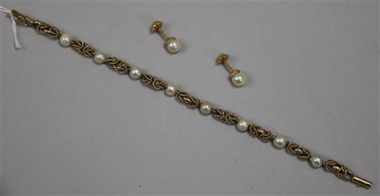 A Middle Eastern gold and cultured pearl bracelet and a pair of similar earrings.